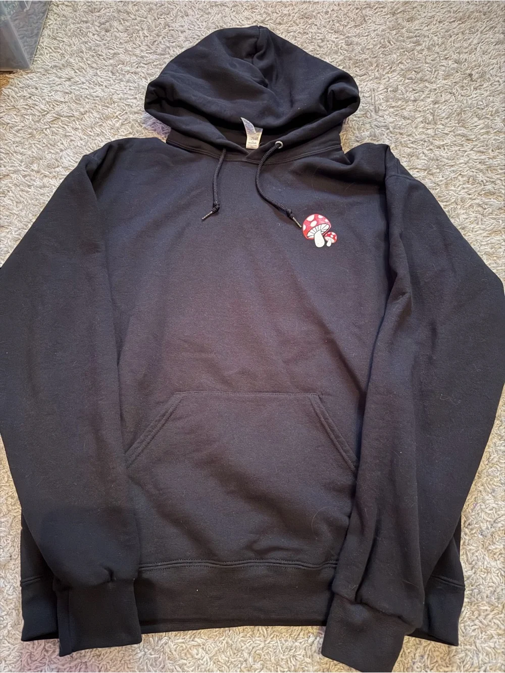 Jerzees Black Hoodie with White 'Don't Trip Over What's Behind You' Graphic